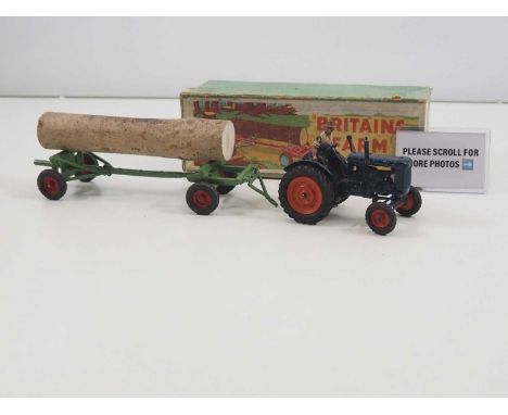 A pair of BRITAINS diecast Farm Series items comprising a boxed 129F Timber Trailer with log load and an unboxed tractor - ge