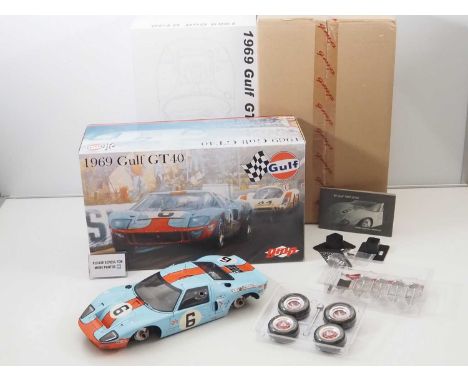 A GMP 12073 1/12 scale diecast Ford GT40 1969 Gulf race car, complete with all accessories and manual - VG/E in VG box with o