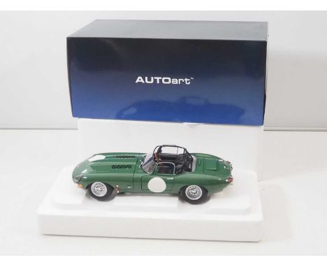 An AUTOART 73648 1/18 scale handbuilt resin Jaguar E-Type Lightweight race car (Opalescent Dark Green) - VG/E in VG box