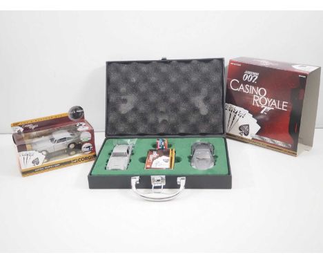 A CORGI 1:36 scale diecast Limited Edition James Bond Casino Royale Aston Martin DB5 & DBS CC99194, complete with poker cards