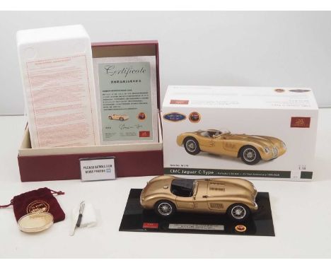 A CMC M-214 1/18 scale diecast Jaguar C-Type race car in gold, limited edition of 300 for the 25th Anniversary of CMC, high-g