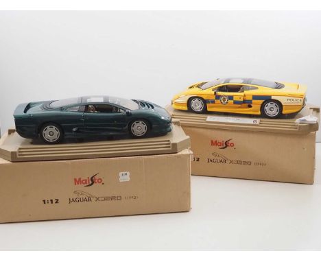 A pair of MAISTO 1:12 scale diecast Jaguar XJ220 cars in green and 'West Midlands Police' yellow livery (including unfitted P