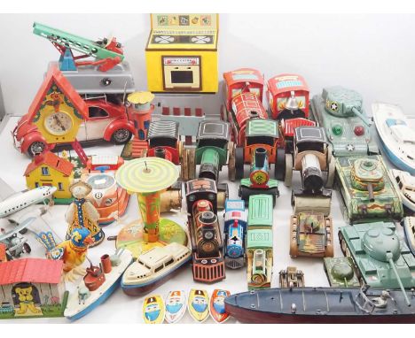 A large crate of vintage tinplate and plastic toys together with boats, planes, tanks etc mostly Eastern European/Czechoslova