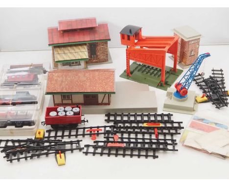 A quantity of FALLER HiT train large scale items to include a diesel loco, wagons, carriage, track and accessories - G/VG in 