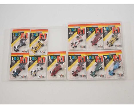 A group of POLISTIL diecast Formula 1 race cars from the 1:55 scale RN Series, sealed on original card backs - VG/E on G/VG c