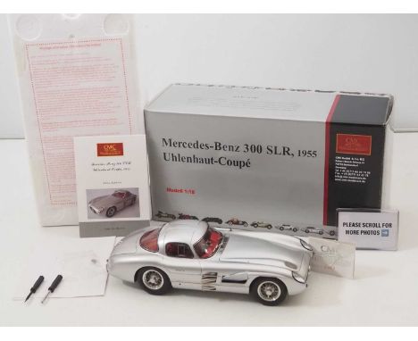 A CMC M-076 1/18 scale diecast Mercedes Benz 300 SLR 1955 Uhlenhaut Coupe racing car, silver, with original tag, accessories 