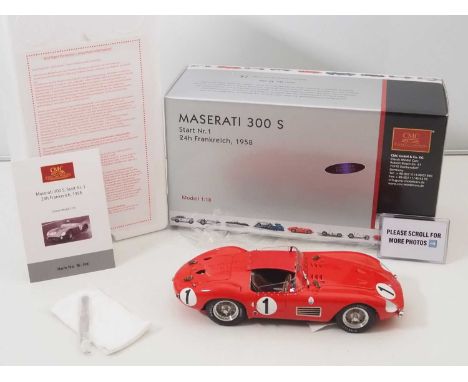 A CMC M-108 1/18 scale diecast Maserati 300S Start Nr.1 24 Hour Frankreich 1958 Limited Edition race car - red, brown leather