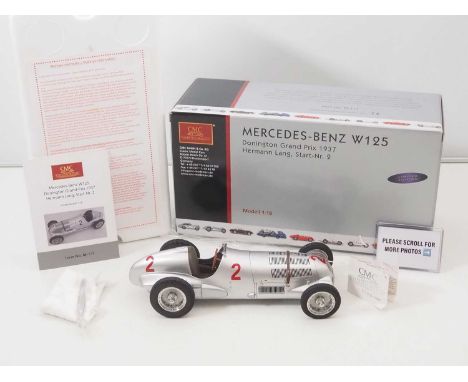 A CMC M-114 1/18 scale diecast Mercedes Benz W125 #2 Donington Grand Prix 1937 Hermann Lang race car, with original tag and p