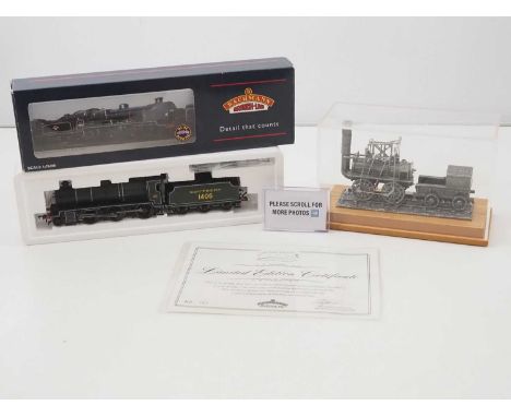 A BACHMANN OO gauge N Class steam loco in SR green livery together with a BACHMANN Static pewter model of 'Locomotion' on a w