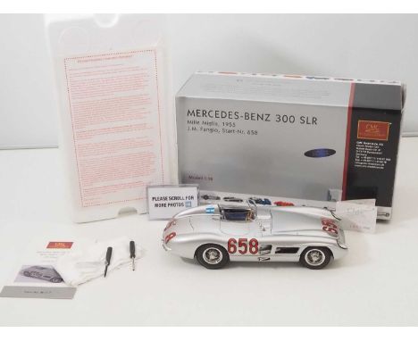 A CMC M-117 1/18 scale diecast Mercedes Benz 300SLR Mille Miglia 1955 - J.M. Fangio - metallic silver, racing number 658, blu