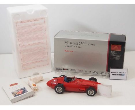 A CMC M-051 1/18 scale diecast Maserati 250F Grand-Prix Sieger 1957  race car, with original tag and paperwork - VG/E in VG b