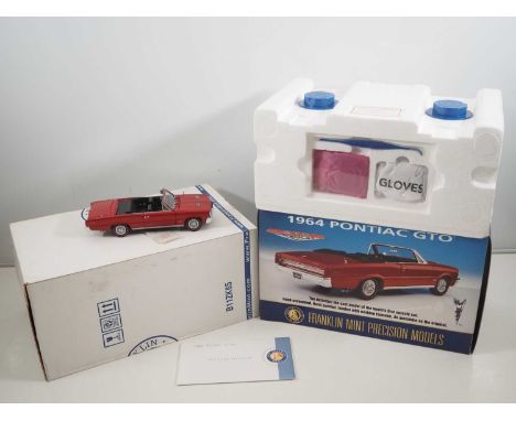 A FRANKLIN MINT 1:24 scale diecast 1964 Pontiac GTO American outline car - VG in G/VG box