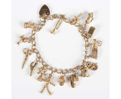 A 9ct gold curblink charm bracelet on a heart shaped padlock clasp, London 1992, fitted with sixteen charms, including a boot