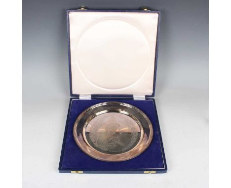 An Elizabeth II silver limited edition plate, designed by Pietro Annigoni, commemorating the Silver Jubilee, with engraved bu