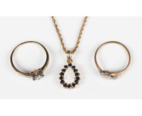 A 9ct gold, opal and sapphire drop shaped pendant, length 2.1cm, a 9ct gold sapphire and diamond cluster ring, ring size appr