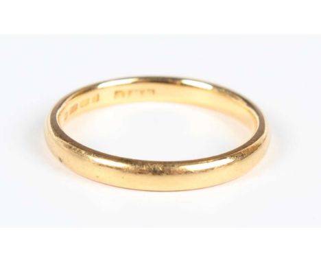 A 22ct gold wedding band, London 1932 by W. Wilkinson Ltd, weight 3.5g, ring size approx N.