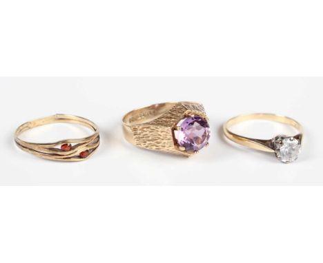 A 9ct gold and amethyst single stone ring, claw set with a circular cut amethyst, Birmingham 1970, ring size approx O, a 9ct 
