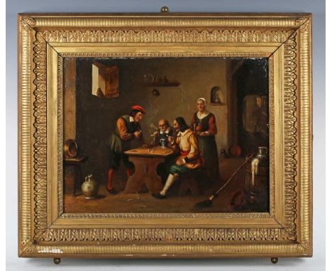 Manner of David Teniers - The Gamblers: men playing dice in a tavern interior, oil on canvas, 43.5cm x 56cm, within a gilt fr