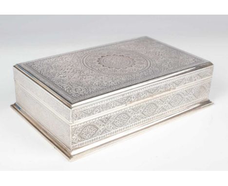 A 20th century Persian silver rectangular cigar box with all-over engraved foliate design, engraved signatures to base, lengt
