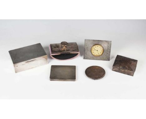 A George VI silver rectangular engine turned cigarette case with scroll thumbpiece, Birmingham 1947 by W.H. Manton Ltd, weigh
