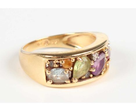 A gold and varicoloured gemstone ring, including an amethyst and a peridot, detailed '14K', weight 5.3g, ring size approx O.