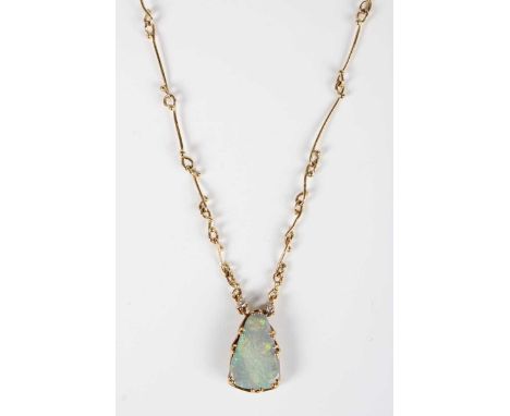 An 18ct gold, opal and diamond pendant necklace, claw set with a triangular shaped opal drop and two circular cut diamonds, o