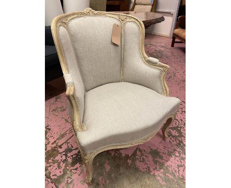 BERGERE, of compact proportions, with a distressed show frame and grey linen upholstery, 67cm W x 86cm H. 