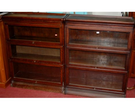 A pair of early 20th century Globe Wernicke style oak three-tier stacking bookcase