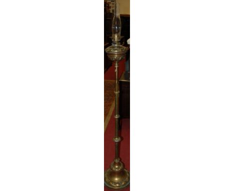 A Victorian embossed brass telescopic oil lamp