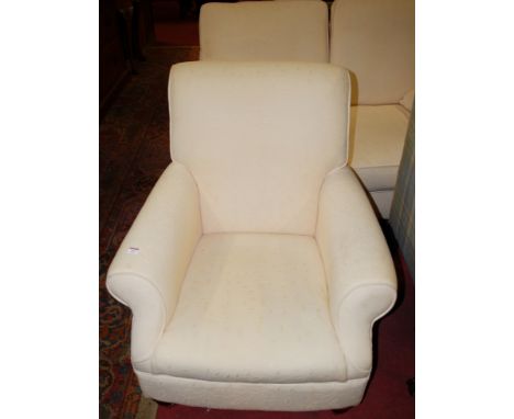 A modern cream upholstered two-seater sofa, together with a pair of a matching open armchairs (3)