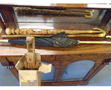 A Windsor and Newton wooden folding artist's easel, a Fox &amp; Co Paragon ivory handled umbrella, an African carved wooden s