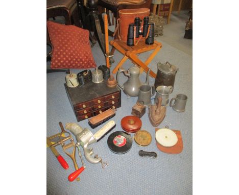 A mixed lot comprising a table top collectors chest, pair of Greenkat field binoculars, vintage tape measures, a Fowler and C