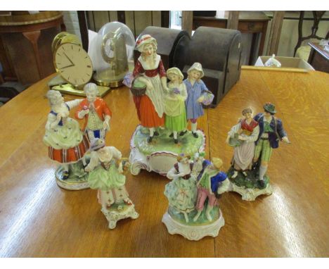 A large 19th century Dresden porcelain figural group of a mother and two children picking flowers, together with one other Dr