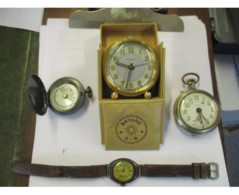 A vintage silver cased wrist watch together with a Subito pocket watch, a Bayard travel alarm clock and a compassLocation: Ca