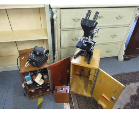 A vintage W. Watson and Sons 'Bactil' binocular microscope, with carry case, together with a Watson projector and a microscop