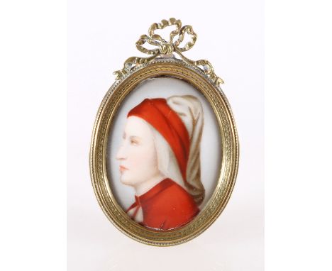 Porcelain panel depicting portrait of a lady within a pinchbeck frame, 8.5cm.