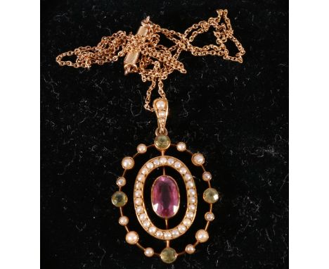 Edwardian 15ct amethyst peridot and seed pearl pendant necklace, on a small belcher chain, marked '15ct', 23cm.   CONDITION R