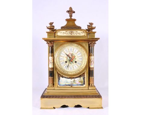 Victorian gilt porcelain brass mantel clock, with Roman porcelain dial, the case with porcelain panel and flanking columns, t