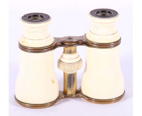 Pair of Victorian ivory mounted opera glasses by Gardiner of Glasgow, 8.5cm.   CONDITION REPORT:  One ivory eyepiece cracked,