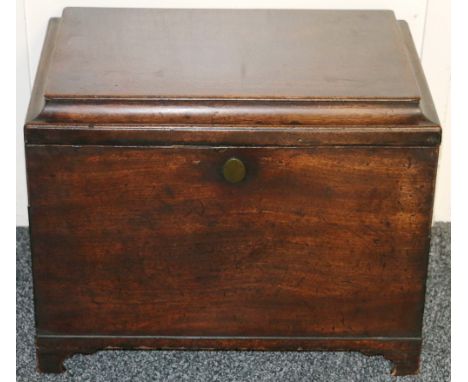 George III mahogany cellerette, the hinged caddy top opening to reveal a zinc lined twin compartment interior, raised on smal
