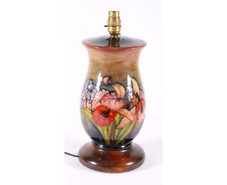 Moorcroft table lamp, signed to base, 35cm.   CONDITION REPORT:  Crazed throughout, no hairlines visible, dirty in places, ma