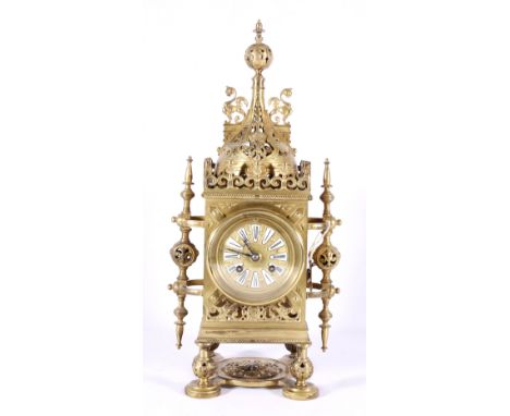 Early 20th century French brass mantel clock of pierced architectural form, with Roman plaque numeral dial and Japy Freres cy