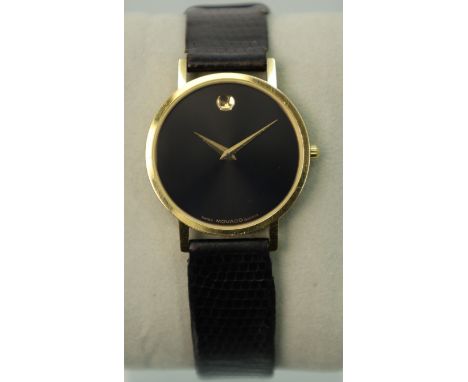 MOVADO. Armbanduhr. The Museums Watch. Schweiz.Circa 31 mm Gehäusedurchmesser ohne Krone. Quarz.  Rundes, vergoldetes Stahlge