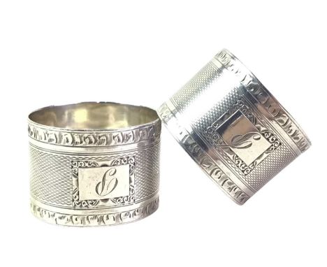 COLLECTION OF SILVER AND WHITE METAL SOUVENIR SPOONS, ALONG WITH TWO SILVER NAPKIN RINGS also a silver spoon and pusher, and 