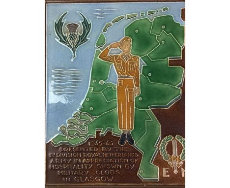 COMMEMORATIVE MILITARY WALL PLAQUE, inscribed 1945-46 PRESENTED BY THE 1ST DIVISION ROYAL NETHERLANDS ARMY IN APPRECIATION OF