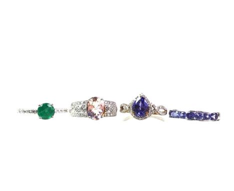 THREE GOLD DRESS RINGS, ALONG WITH A PLATINUM RING the platinum ring set with diamond chips, along with two white gold rings 