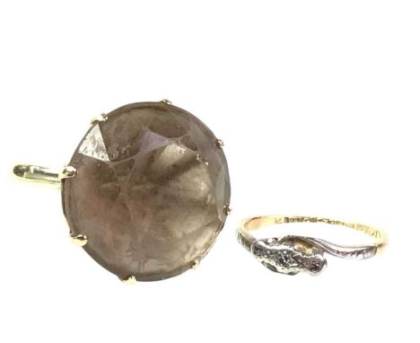 SMOKY QUARTZ RING ALONG WITH ANOTHER, the quartz ring in nine carat gold, along with a diamond three stone ring, in eighteen 