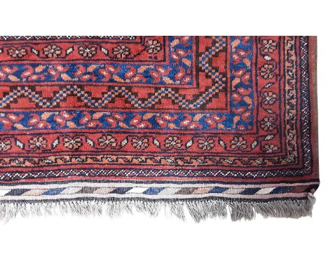 MIDDLE EASTERN CARPET, EARLY 20TH CENTURY  decorated with floral and stylised geometric designsgood overall condition with so