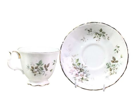 ROYAL ALBERT TEA AND DINNER SERVICE, HAWORTH PATTERN with floral and gilt decoration, comprising cups, saucers, plates, bowls