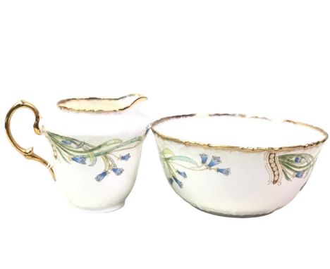 LATE VICTORIAN PART TEA SERVICE, decorated with trailing leaf and bluebells in colours and gilt